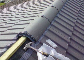 Tile roof with new ridge tiles by Tradeall Roofing
